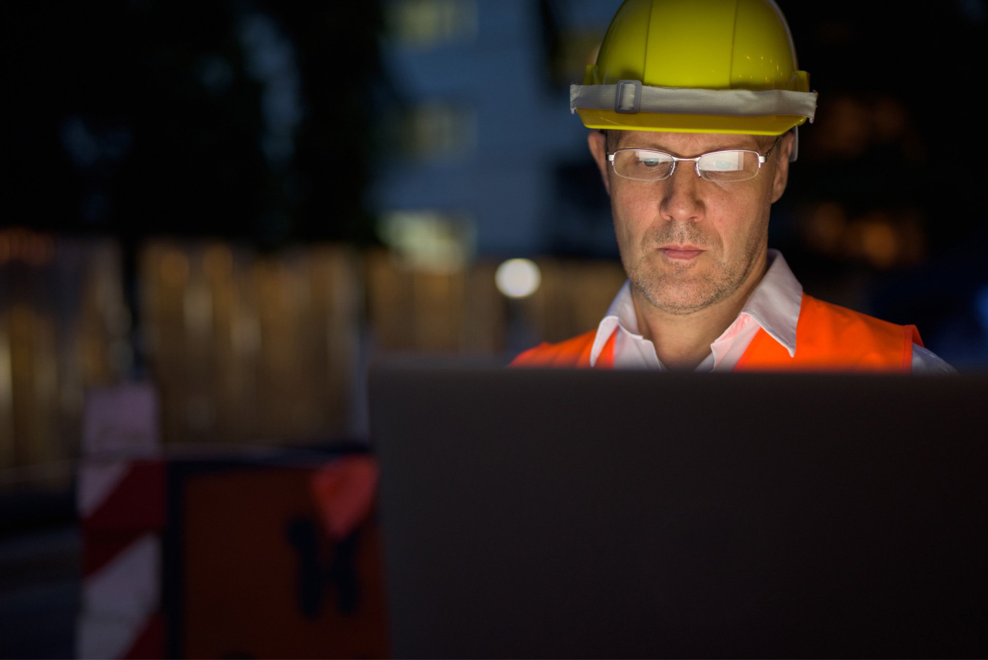 construction worker on computer